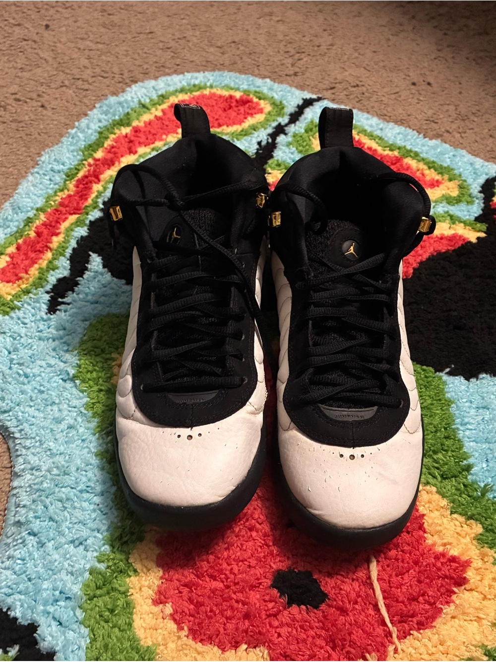 Jordan Kids Black and White High-Top Sneakers with Gold Accents